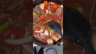 Chuck beef slow cook in a cast iron skillet.