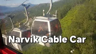 Going uphill on cable car in Narvik city in Norway