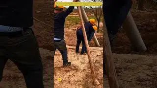 How to erect utility poles manually