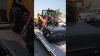 Case offloading from recovery vehicle.