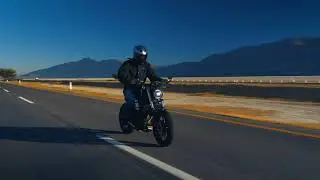 Copyright free stock footage || man speeding a road on a motorcycle