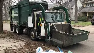 Cleveland Heights Heil carry-can front loader garbage truck