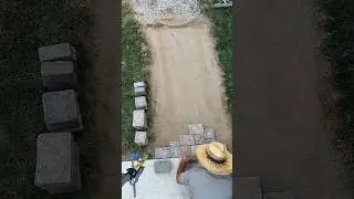 Pavers being laid.