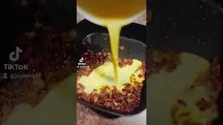 sausage, chorizo, eggs, bacon bits, cheese, chumuth(tortilla)