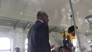 Evangelical reverend on train, Cape Town, South Africa