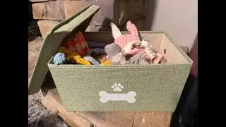 Organize dog toys with an easy-lift basket