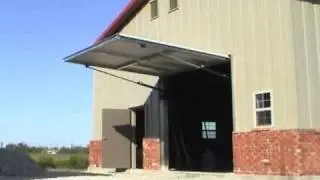Home Made hydraulic one piece shop door