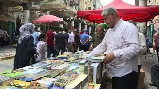 On historic Baghdad street, spirit of music and culture shines
