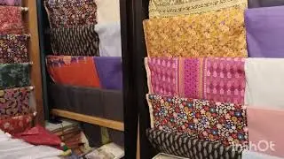A visit to branded cut piece to see latest collection,