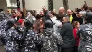 Protesters and security forces scuffle in Beirut