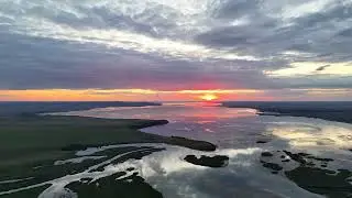 На моторных лодках по Иртышу, до Шульбинского водохранилища.