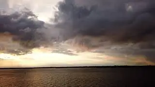 Sun Rays and Clouds Dancing Over Mount Hope Bay