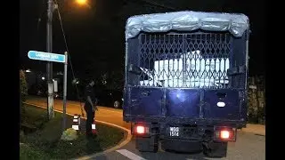 Police cars, truck at Najib’s house