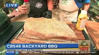 Pit Master Nick Turner preps smoked brisket