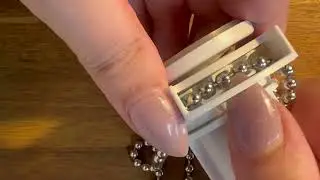 Replacing the chain on a Twist2Fit roller blind