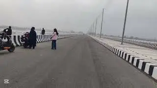 देश जोडने पुल ( माहाकाली नदीमा बनेको चारलेनको पक्की पुल ।