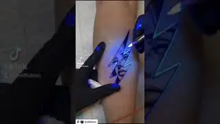 Awesome tattoo by @jjhalltattoo using Mom&rsquo;s Tattoo Ink Blacklight Sensitive Nuclear Colors!