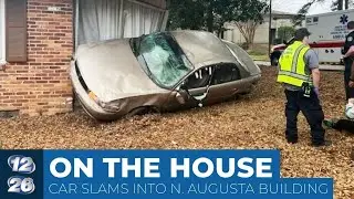 At teh scene where car slammed intoi North Augusta home
