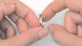 E4917 - Tanzanite 0.30CT And Diamond 9K Gold Ring