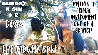 Making a primal instrument out of a branch. The Mouth Bow - Almost a Sin plus 2 Dogs.