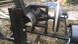 New wood processor with self feed tube. For burning wood gas fuel.