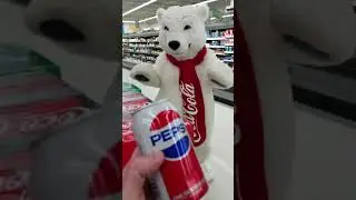 Putting a Pepsi in the Coca Cola bear's face!