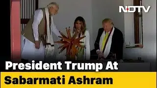 Trumps Spin Gandhi's 'Charkha' At Sabarmati Ashram In Ahmedabad