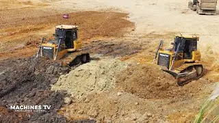 Operator Expertly Bulldozer Continued to Push Forward Large Capable Truck Holding Tons of Soil
