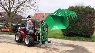 Hecklader - Theilmann Landtechnik GmbH - Carraro mit Heckloader Krokodilgebiss Heckstapler Schaufel