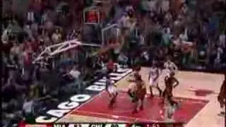 Luol Deng drives hard for an And-1 play