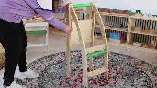 Show a foldable wooden learning tower