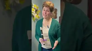 Teaching kids recorder with the correct hand on top