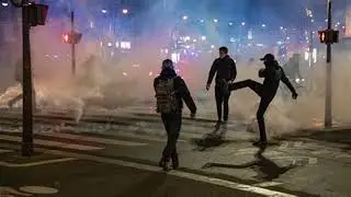 France violence 200 arrested buses set on fire as protesters clash with police