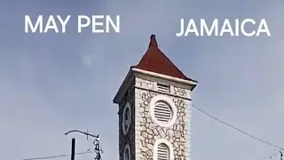 May Pen Town Centre join me as I walk up the streets. 