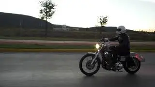 Copyright free stock footage | Person driving a motorcycle in the street