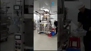 Система наполнения с помощью весовых головок VFFS, машина для наполнения, запечатывания и упаковки пакетов.
