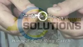 Hinged split ring catch