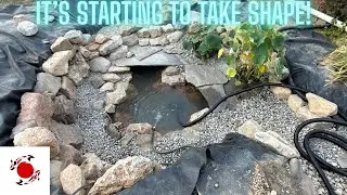 Finishing the rocks and test filling the pond
