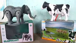 battery opreted cow elephant toys unboxing ! animals elephant cow toy unboxing and review