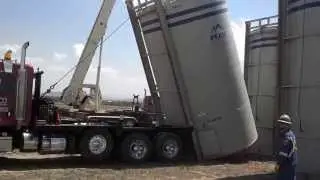 400bbl up right tank using a winch truck