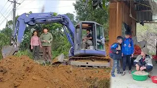 Building a new house. Dang and Thanh were delighted to receive help from their kind neighbors.