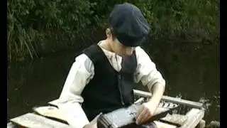 Kantele - Votic boy plaing votic traditional inatrument 