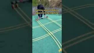 Tape marking machine for parking space