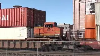 BNSF Stacktrain with NS DPU, BNSF Intermodal and Amtrak meet. Kansas City, MO 2/25/17