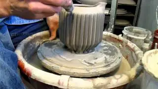 feathering vertical pottery