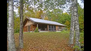 Single-story, Swedish Cope dovetail-hewn log cabin