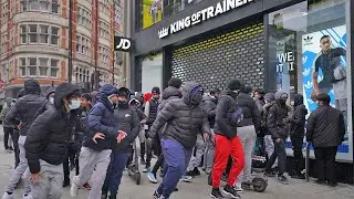 Huge queues as shops reopen in lockdown easing