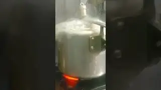 super fast steam coming out with pressure cooker whistle sound