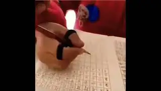 Toddler hold your pencils..