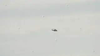 Camouflage fighter jet in flight
